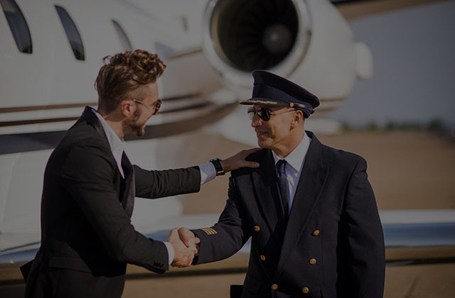 Private jet charter pilot and a passenger